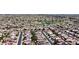 Expansive community aerial view featuring diverse homes, landscaping and golf course at 17406 N Escalante Ln, Surprise, AZ 85374