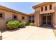 Inviting front entrance with well-maintained desert landscaping at 17406 N Escalante Ln, Surprise, AZ 85374