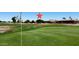 Scenic golf course view showing meticulously maintained greens at 17406 N Escalante Ln, Surprise, AZ 85374