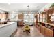 Bright and spacious kitchen with a view of the garden, casual seating and decorative accents at 17406 N Escalante Ln, Surprise, AZ 85374