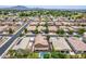 Gorgeous homes in a well-maintained neighborhood boasting lush greenery and a sparkling swimming pool in the backyard at 1876 E Azalea Ct, Gilbert, AZ 85298