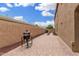 This home features a spacious backyard with an outdoor BBQ grill and privacy wall at 1876 E Azalea Ct, Gilbert, AZ 85298
