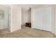 Spacious bedroom featuring double closets and carpeted floors at 1876 E Azalea Ct, Gilbert, AZ 85298