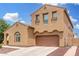 Charming two-story home with a two-car garage and arched front entry at 1876 E Azalea Ct, Gilbert, AZ 85298
