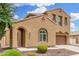 Charming two-story home with a two-car garage and arched front entry at 1876 E Azalea Ct, Gilbert, AZ 85298
