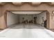 This spacious garage has a clean floor and plenty of room for storage at 1876 E Azalea Ct, Gilbert, AZ 85298