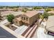 Aerial view of home showcasing desert landscaping, tile roof, a driveway and proximity to neighborhood amenities at 1876 E Azalea Ct, Gilbert, AZ 85298
