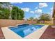Enjoy this backyard pool, playground and serene landscaping, perfect for outdoor fun at 1876 E Azalea Ct, Gilbert, AZ 85298