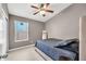 Comfortable bedroom with a window and stylish decor at 1882 W Wildhorse Dr, Chandler, AZ 85286