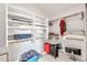 Walk-in closet with ample storage space and built-in shelving at 1882 W Wildhorse Dr, Chandler, AZ 85286