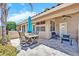 Outdoor patio featuring a dining table, built-in grill, and ceiling fan at 1882 W Wildhorse Dr, Chandler, AZ 85286