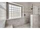 Modern bathroom showcasing a glass-enclosed shower with unique tile detailing at 1882 W Wildhorse Dr, Chandler, AZ 85286