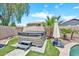 Spa with steps and adjacent turf, next to pool and landscaping at 1882 W Wildhorse Dr, Chandler, AZ 85286