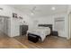 Cozy bedroom features vaulted ceilings, a ceiling fan, and neutral decor at 20424 N 96Th Ln, Peoria, AZ 85382