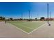 Community tennis courts with nets, ideal for tennis enthusiasts and friendly matches at 20424 N 96Th Ln, Peoria, AZ 85382