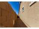 View of the side yard with a private block wall at 21031 E Poco Calle St, Queen Creek, AZ 85142