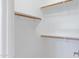 Walk-in closet with ample shelving and plenty of storage space at 21299 E Roundup Way, Queen Creek, AZ 85142
