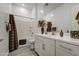 Bright bathroom featuring a shower-tub combo and a modern vanity with countertop space at 21711 E Arroyo Verde Dr, Queen Creek, AZ 85142