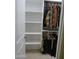 Organized walk-in closet with ample shelving, hanging rods, and a clean, white interior at 21711 E Arroyo Verde Dr, Queen Creek, AZ 85142