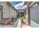 Inviting courtyard with well-maintained landscaping and a walkway to the front door at 21711 E Arroyo Verde Dr, Queen Creek, AZ 85142