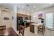 Well-lit kitchen featuring stainless steel appliances and a eat-in island at 21711 E Arroyo Verde Dr, Queen Creek, AZ 85142
