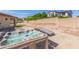 Relaxing backyard oasis featuring a private hot tub, perfect for unwinding after a long day with privacy walls at 2365 N Springfield St, Buckeye, AZ 85396