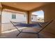 A cozy balcony featuring a relaxing hammock with a view of the neighborhood homes at 2365 N Springfield St, Buckeye, AZ 85396
