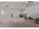 Spacious loft with a ceiling fan, a small dining table set, exercise equipment and ample natural light at 2365 N Springfield St, Buckeye, AZ 85396