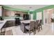 Modern kitchen features stainless appliances, lots of cabinets and tile flooring at 23730 W Hess Ave, Buckeye, AZ 85326