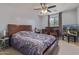 Bedroom with gray walls, ceiling fan and neutral carpet and a large window at 2519 N 73Rd Dr, Phoenix, AZ 85035