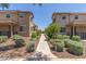 Attractive townhome exteriors feature well-maintained landscaping and neutral color palette at 2519 N 73Rd Dr, Phoenix, AZ 85035