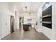 Modern kitchen featuring stainless steel appliances, center island, white cabinetry and tile floors at 26264 N 46Th St, Phoenix, AZ 85050