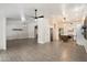 Open-concept floor plan featuring a tile floors connecting the kitchen and living area at 26264 N 46Th St, Phoenix, AZ 85050