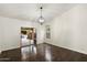 Bright living room featuring hardwood floors, window, and sliding glass doors at 26264 N 46Th St, Phoenix, AZ 85050