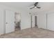 Open bedroom featuring ensuite bathroom and dual closets for ample storage at 2712 W Oakgrove Ln, Chandler, AZ 85224