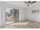 Inviting bedroom with tiled floors and sliding glass doors to an outdoor space at 2712 W Oakgrove Ln, Chandler, AZ 85224