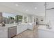 Bright kitchen with stainless steel dishwasher and a beautiful, large window at 2712 W Oakgrove Ln, Chandler, AZ 85224