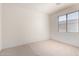 Bright bedroom with carpet and a window providing natural light at 2732 E Tyson St, Chandler, AZ 85225