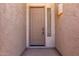 Close up of front door with light fixture and adjacent small window at 2732 E Tyson St, Chandler, AZ 85225