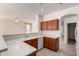 Kitchen features white countertops, appliances, and cabinets with a view to a dining area at 2732 E Tyson St, Chandler, AZ 85225
