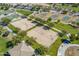 Aerial view of community sand volleyball courts and basketball courts at 30263 W Crittenden Ln, Buckeye, AZ 85396