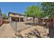 View of the spacious backyard with a covered patio at 30263 W Crittenden Ln, Buckeye, AZ 85396