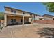 A view of the spacious backyard with a covered patio and ample room to enjoy at 30263 W Crittenden Ln, Buckeye, AZ 85396