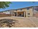 Expansive backyard featuring a covered patio, perfect for outdoor entertaining at 30263 W Crittenden Ln, Buckeye, AZ 85396
