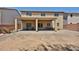 The large backyard with covered patio offers a great space for Gathering and guests at 30263 W Crittenden Ln, Buckeye, AZ 85396