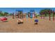 A colorful playground with various play structures for imaginative fun at 30263 W Crittenden Ln, Buckeye, AZ 85396
