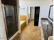 Well-lit bathroom with double sinks, granite counters, tile floor and shower with glass door at 3502 W Belle Ave, San Tan Valley, AZ 85144