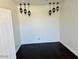 Bedroom with wood flooring and hanging lantern lighting at 3502 W Belle Ave, San Tan Valley, AZ 85144