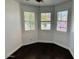 Bedroom with wood flooring and natural light from the windows at 3502 W Belle Ave, San Tan Valley, AZ 85144