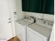 A laundry room with white washer and dryer at 3502 W Belle Ave, San Tan Valley, AZ 85144